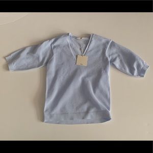 Tibi size small blue tech poly shirt.